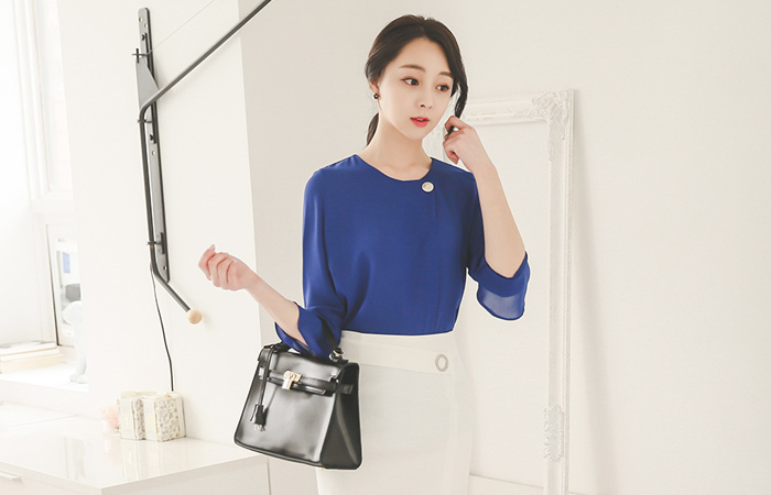 ビッグボタンポールデッドラウンドブラウス